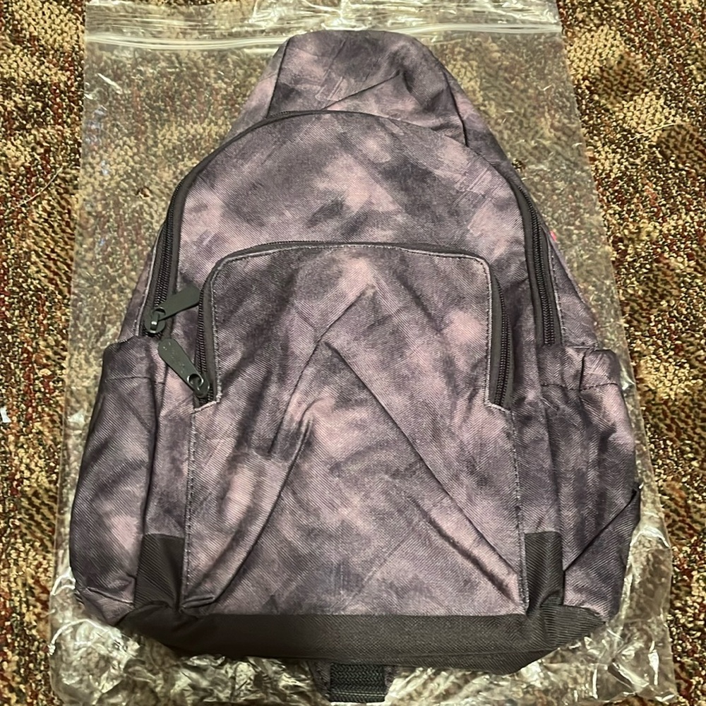 Thirty-one Adjustable Sling Backpack in Dusty Smoke.